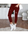 Plus rozmiar 4XL 2019 kobiety moda Casual otwory zniszczone Knee Skinny ołówek spodnie spodnie czarny biały Stretch Ripped spodn