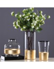 Wysoki ozdobny szklany wazon ze złotym zdobieniem czarne wykończenie dekoracyjny do ekspozycji kwiatów