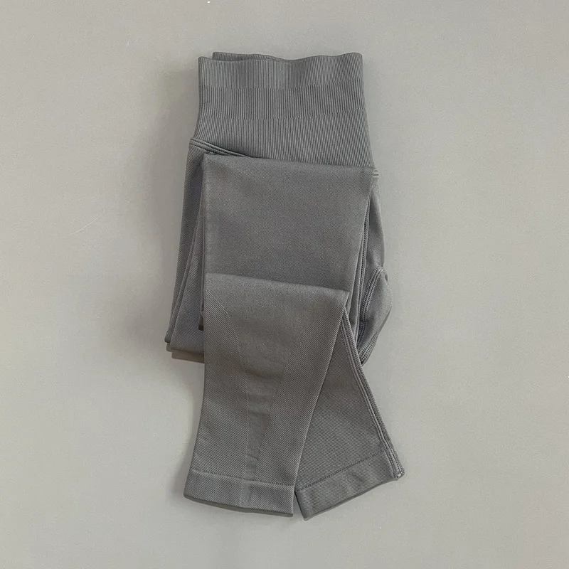 Bezszwowe legginsy damskie z efektem push-up na siłownię i jogę Szary