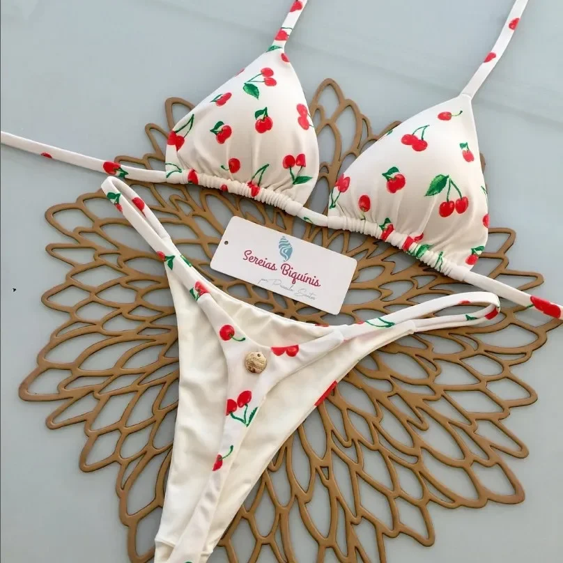 Seksowne bikini z koronkowym topem wiązanym na szyi i stringami Złoto