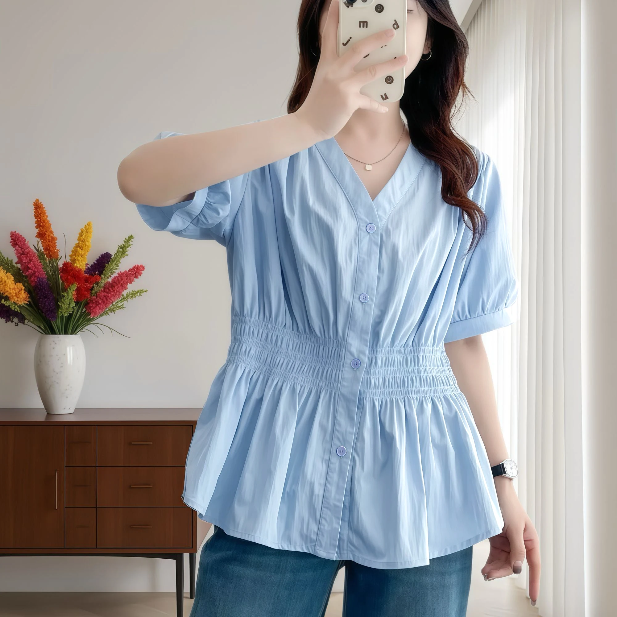 Bluzka plus size z dekoltem V i elastyczną gumką Niebieski