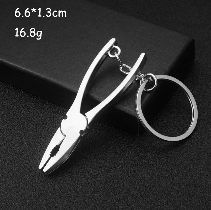 Brelok multitool – mini narzędzie kieszonkowe do kluczy Różowy