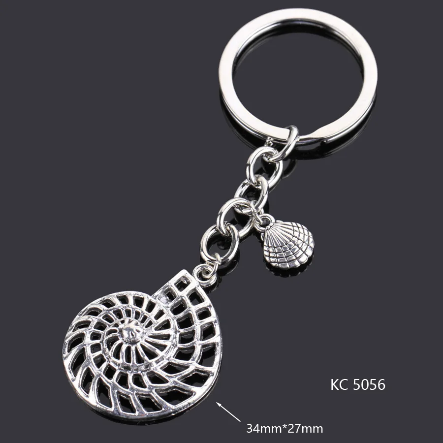 Brelok serce wisiorek do kluczy i torebki 5056 muszla shell conch