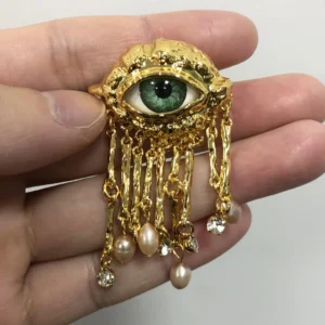 Broszka vintage z perłą i frędzlami – motyw oka Brooch pin
