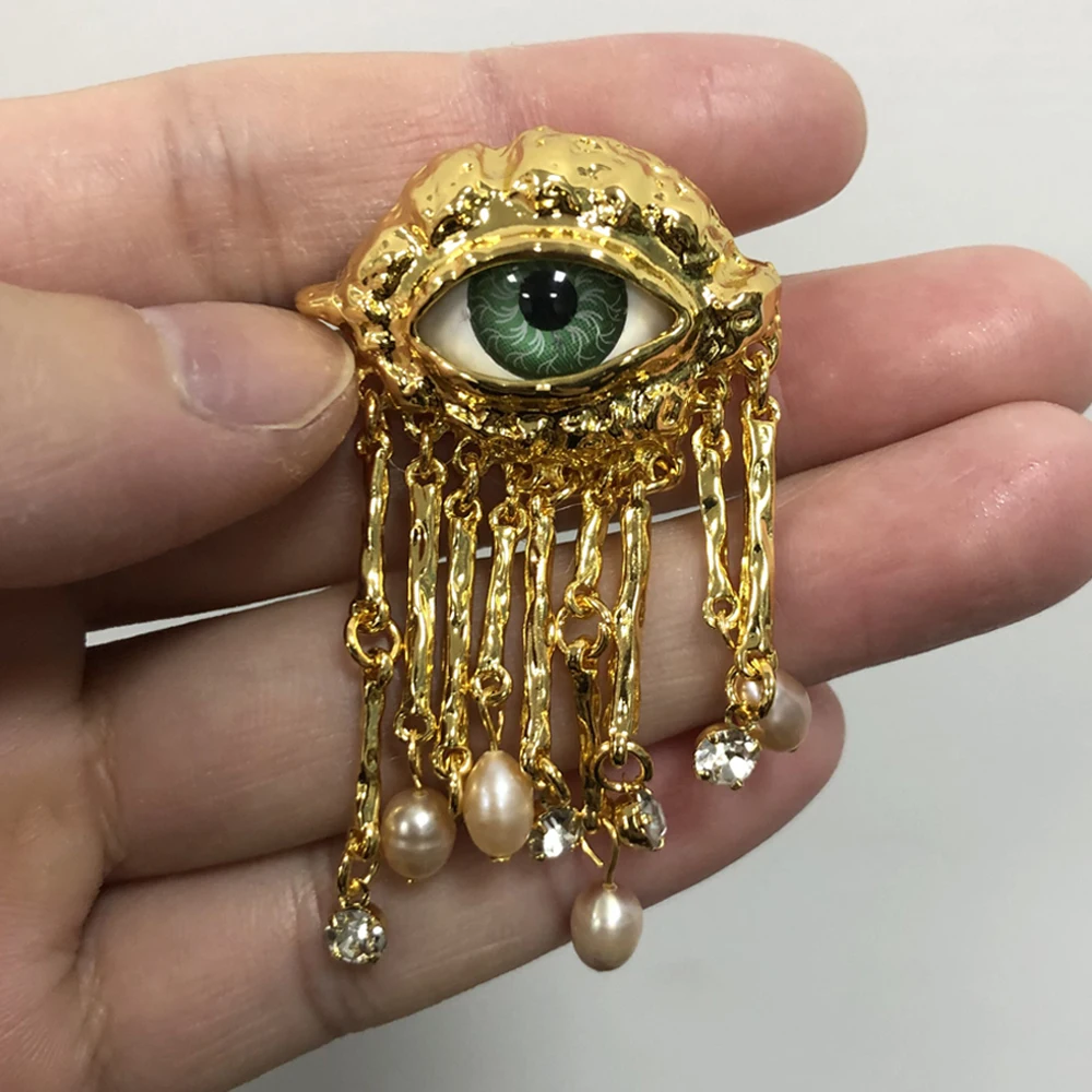 Broszka vintage z perłą i frędzlami – motyw oka Brooch pin