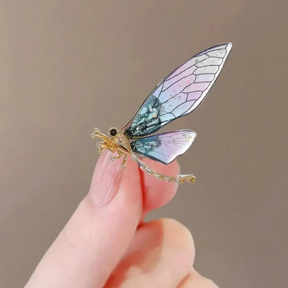 Broszka ważka i motyl z cyrkoniami i imitacją perły Fioletowy
