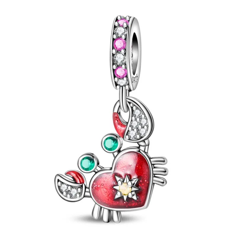 Charms morskie ze srebra 925 – delfin, krab, łódka Kawałki czerwieni