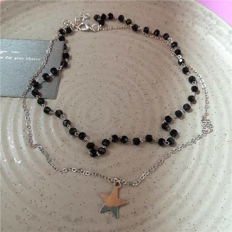 Czarny choker Y2K z zawieszką serce i gwiazda - biżuteria grunge 2