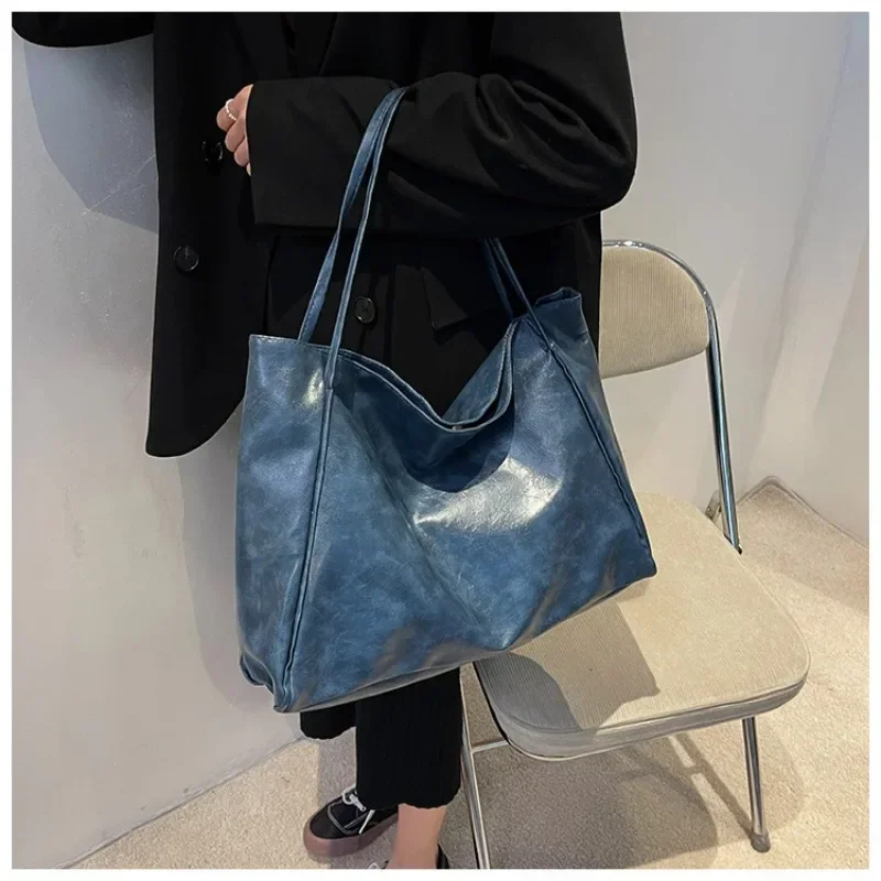 Damska torba na ramię z ekoskóry – pojemna torebka crossbody Niebieski