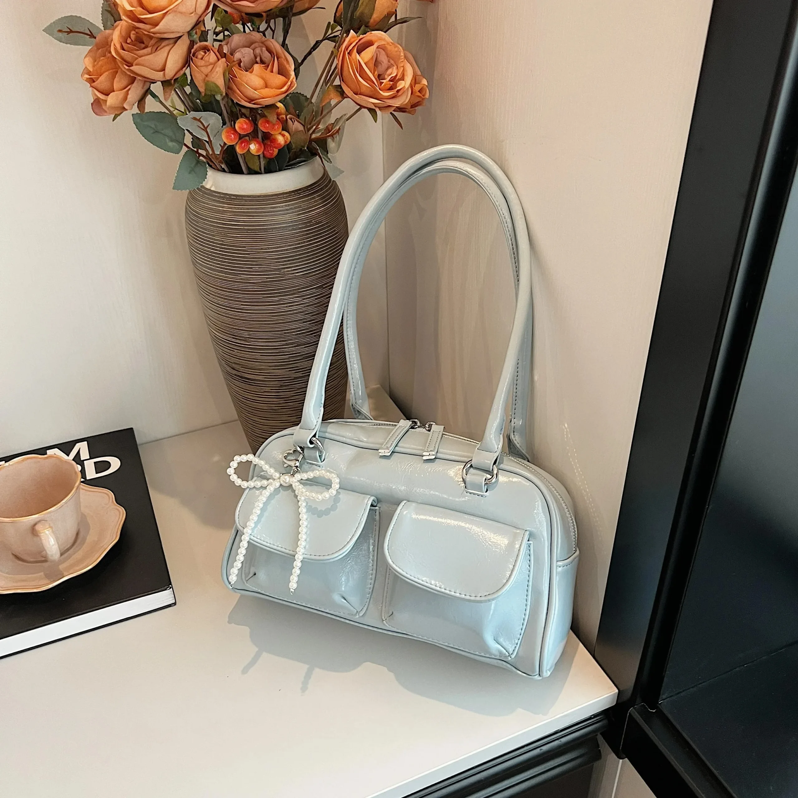 Damska torebka pod pachę z kokardą, pillow bag w stylu koreańskim Niebieski