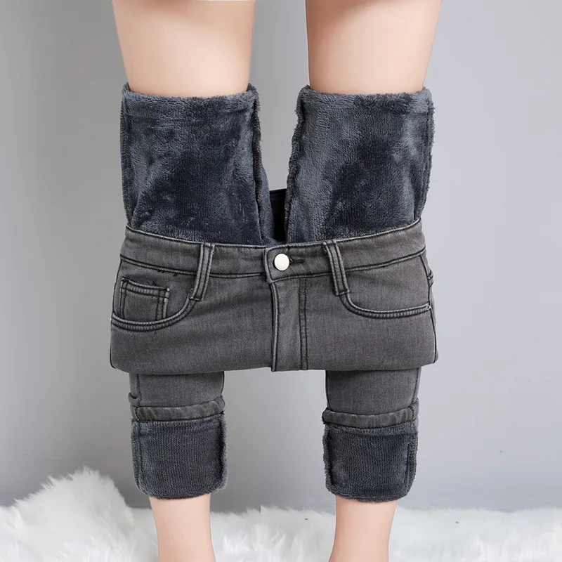 Damskie dżinsy termiczne z polarem skinny na zimę Biały