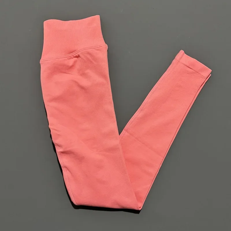 Damskie legginsy bezszwowe modelujące pośladki na siłownię Koralowy