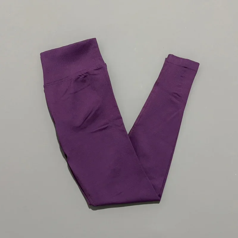 Damskie legginsy bezszwowe modelujące pośladki na siłownię Śliwkowy