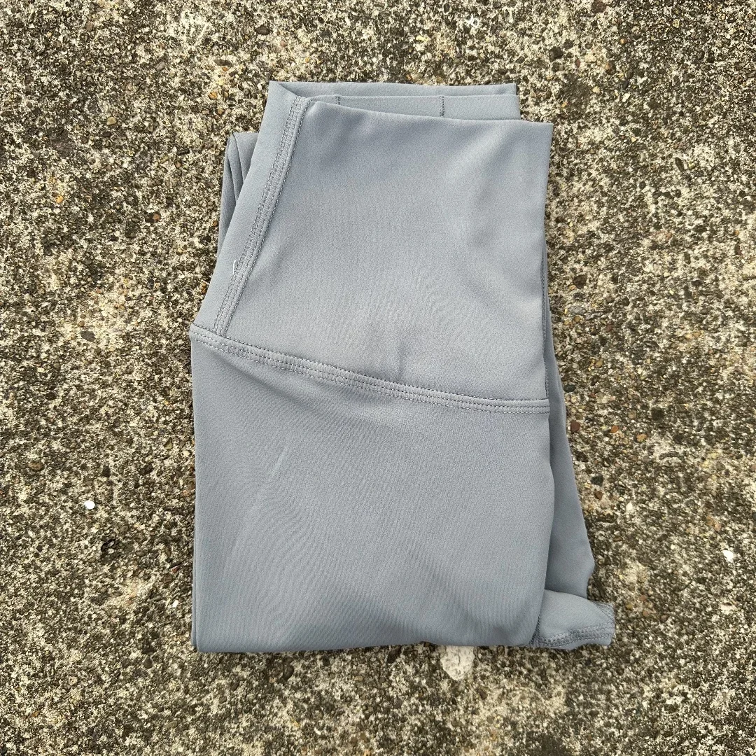 Damskie legginsy do jogi z wysokim stanem i kieszenią Szary