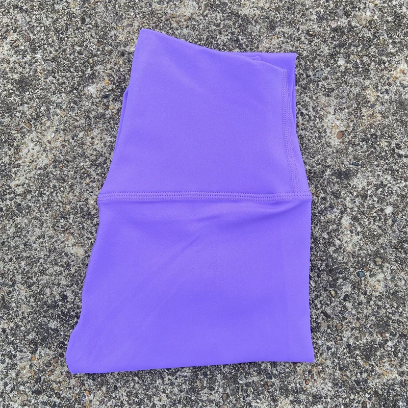 Damskie legginsy sportowe z kieszeniami i wysokim stanem Fioletowy