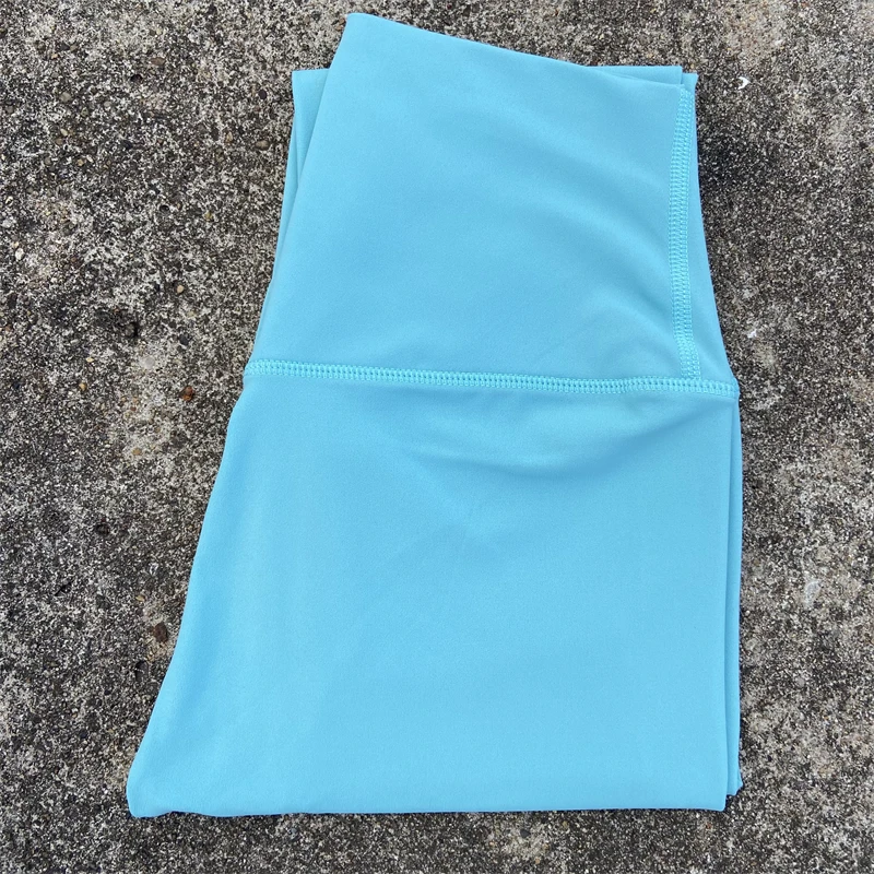 Damskie legginsy sportowe z kieszeniami i wysokim stanem Trendy cyan