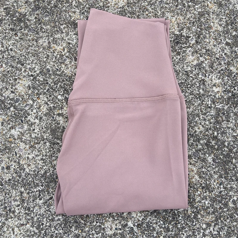 Damskie legginsy sportowe z kieszeniami i wysokim stanem Różowy