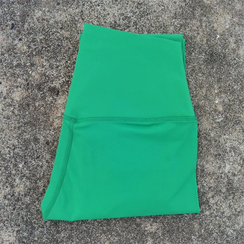 Damskie legginsy sportowe z kieszeniami i wysokim stanem Zielony