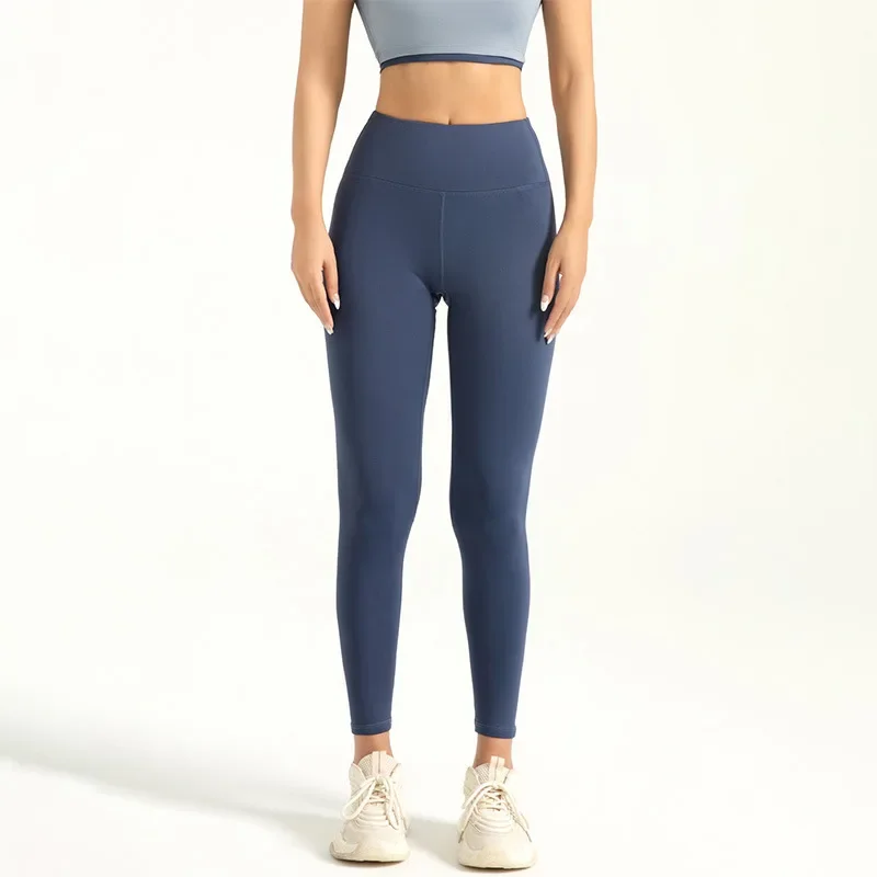 Damskie legginsy sportowe 7/8 z wysokim stanem Ciemnoniebieski