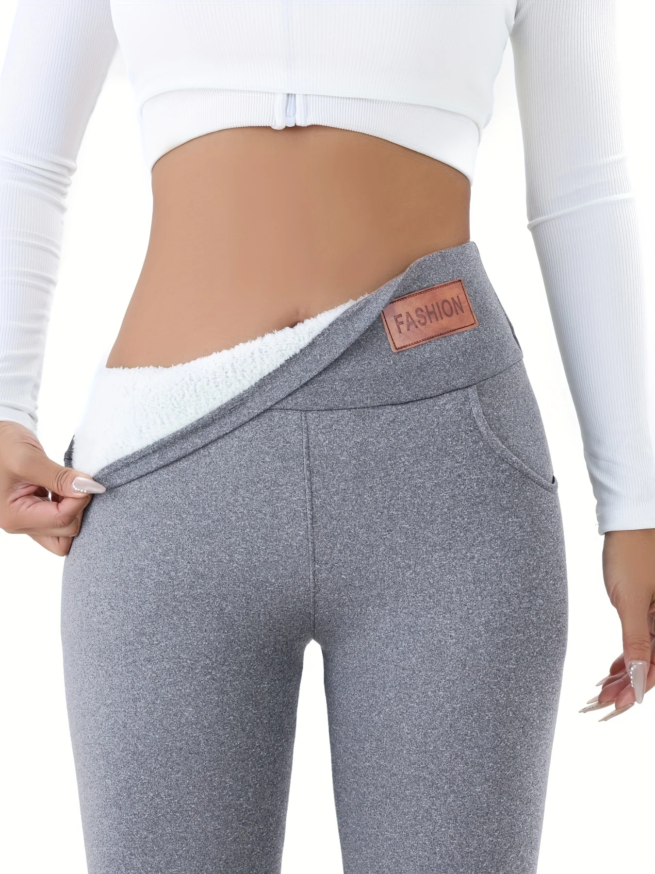 Damskie legginsy termiczne ocieplane z polarem i kieszeniami Szary