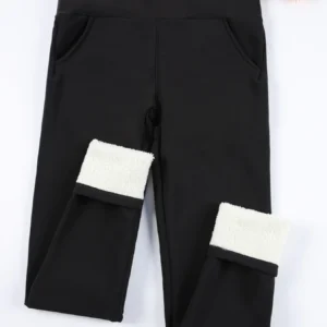 Damskie legginsy welurowe ocieplane z kieszeniami . czarny