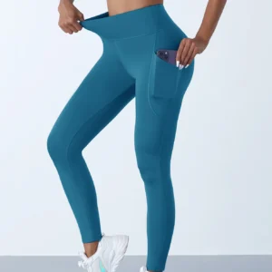 Damskie legginsy z wysokim stanem i kieszeniami push up Morski