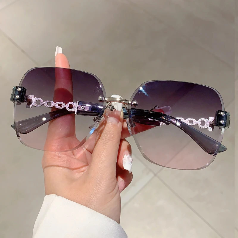 Damskie okulary przeciwsłoneczne oversize bez oprawek 2354c2 greypink