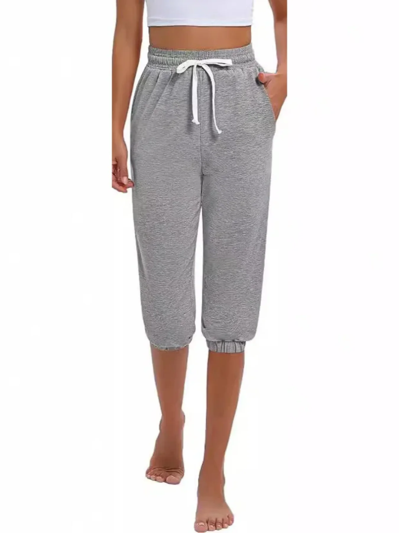 Damskie spodnie capri 7/8 z wysokim stanem i troczkiem Szary