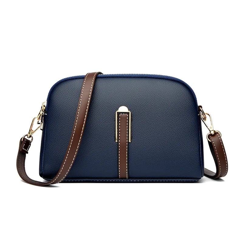 Designerska torebka damska z klapką ze skóry bydlęcej — crossbody Niebieski