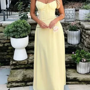 Elegancka długa sukienka na ramiączkach z odkrytymi plecami Żółty