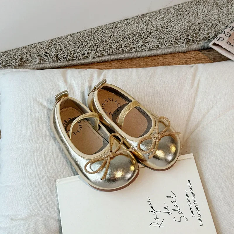 Eleganckie buty dla dziewczynki z kokardką Złoty