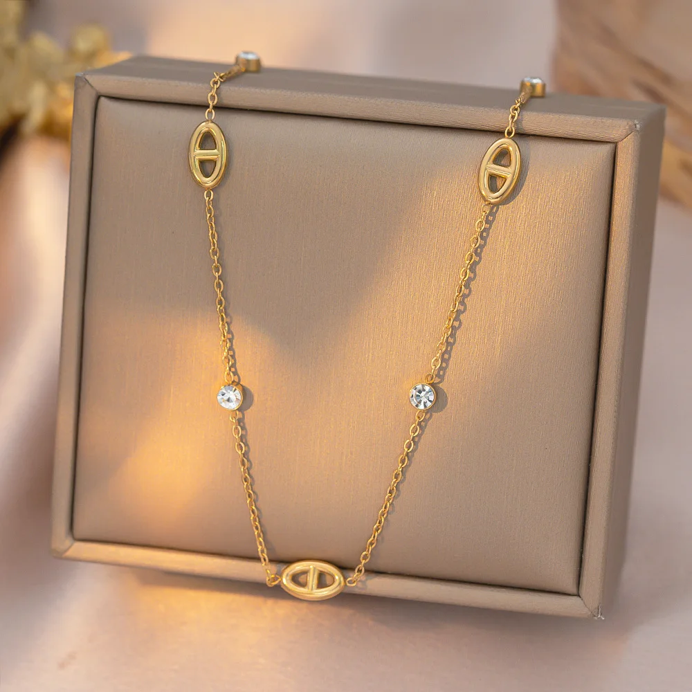 Komplet biżuterii z białą cyrkonią - naszyjnik i bransoletka ze stali A necklace