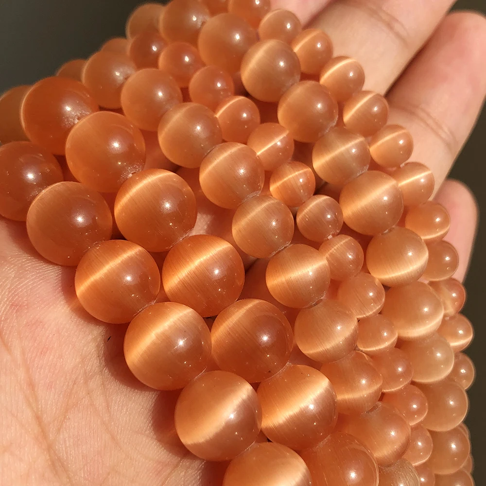 Koraliki kamień księżycowy białe kocie oko - 4-12 mm do biżuterii Pomarańczowy