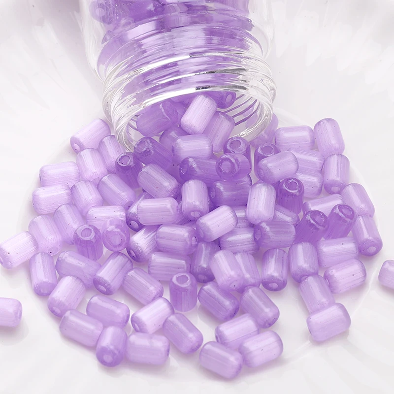Koraliki dystansowe kocie oko jujube 4x6 mm, 60 sztuk Fioletowy