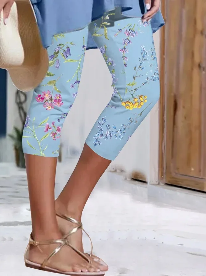 Legginsy damskie 3/4 z kolorowym nadrukiem Niebieski