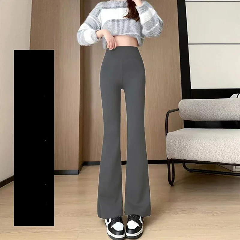 Legginsy do jogi z wysokim stanem - rozkloszowane, modelujące spodnie sportowe Szary