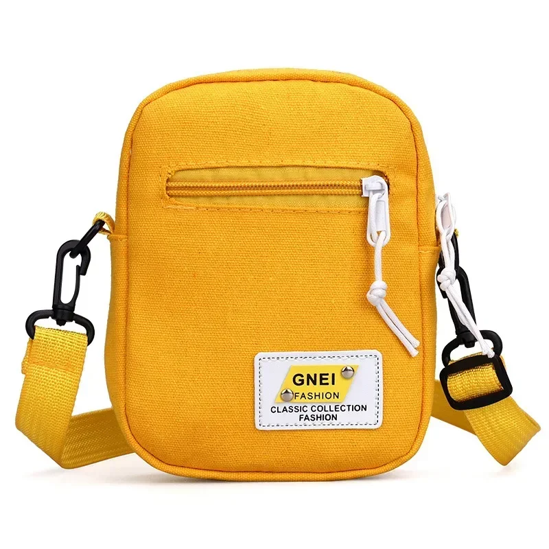 Mała płócienna torebka crossbody na telefon żółty