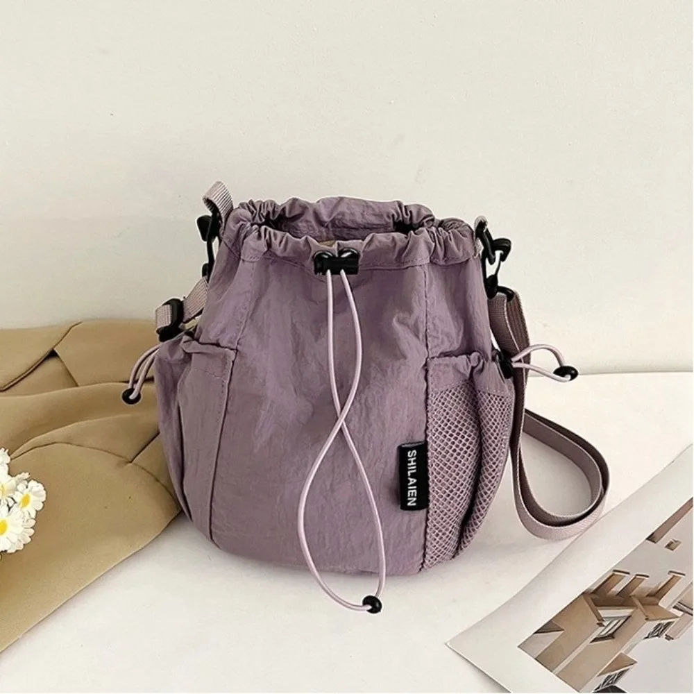 Mała torebka nylonowa na ramię crossbody Fioletowy