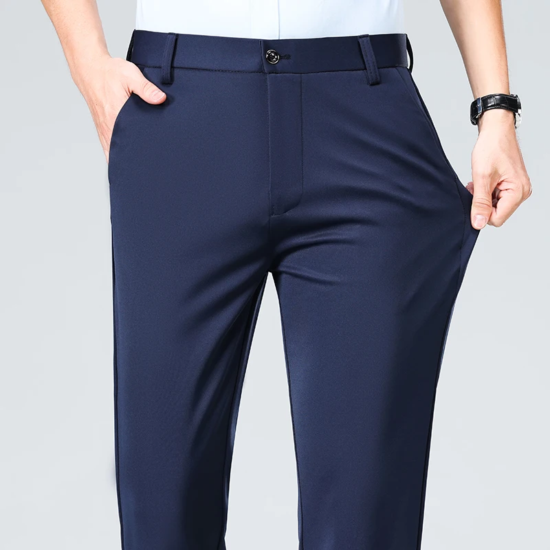 Męskie spodnie garniturowe na lato – cienkie, eleganckie Niebieski