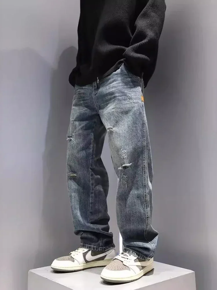 Męskie jeansy baggy z przetarciami hip-hop streetwear Niebieski