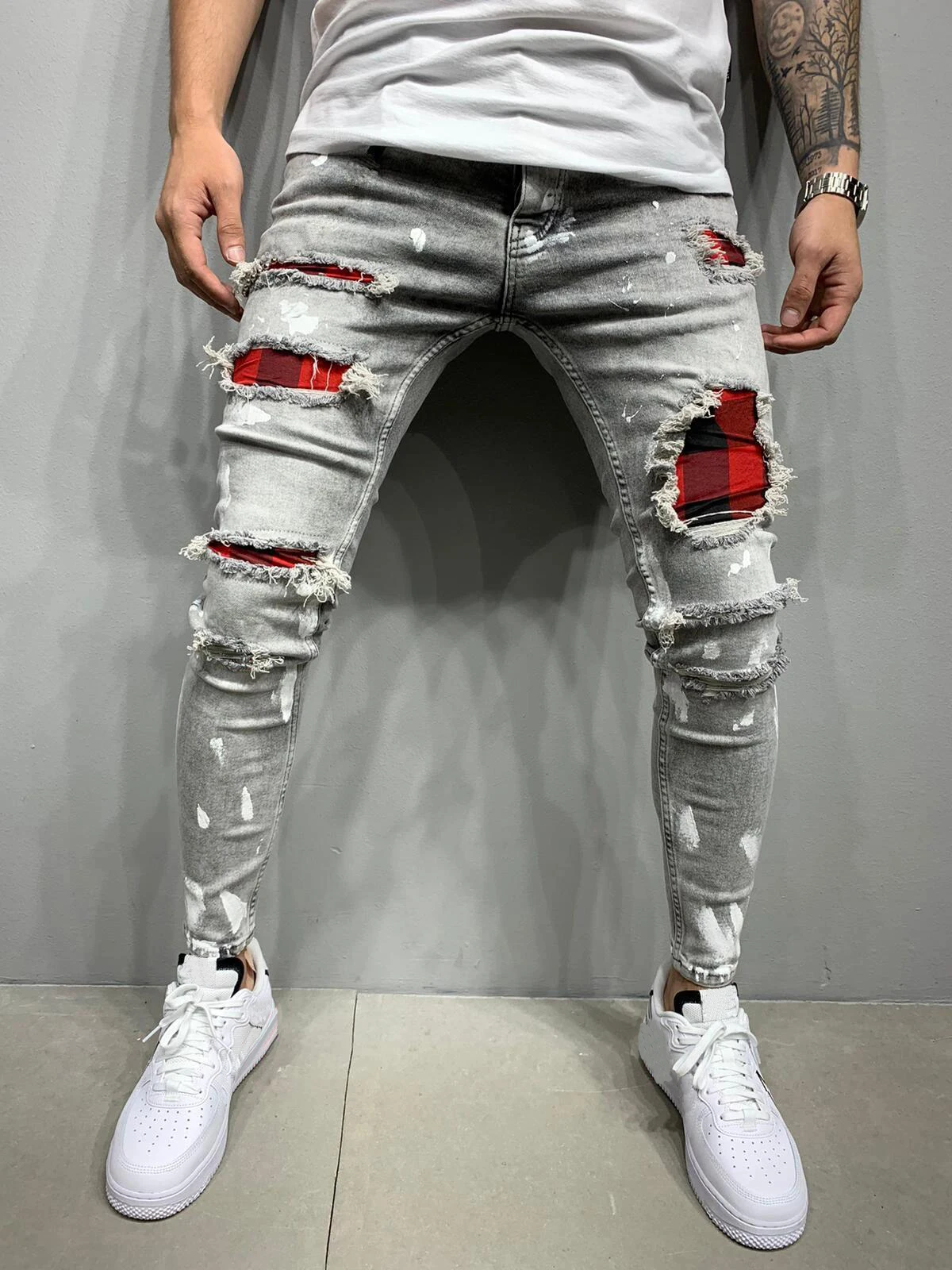 Męskie jeansy slim fit z przetarciami H007a szary