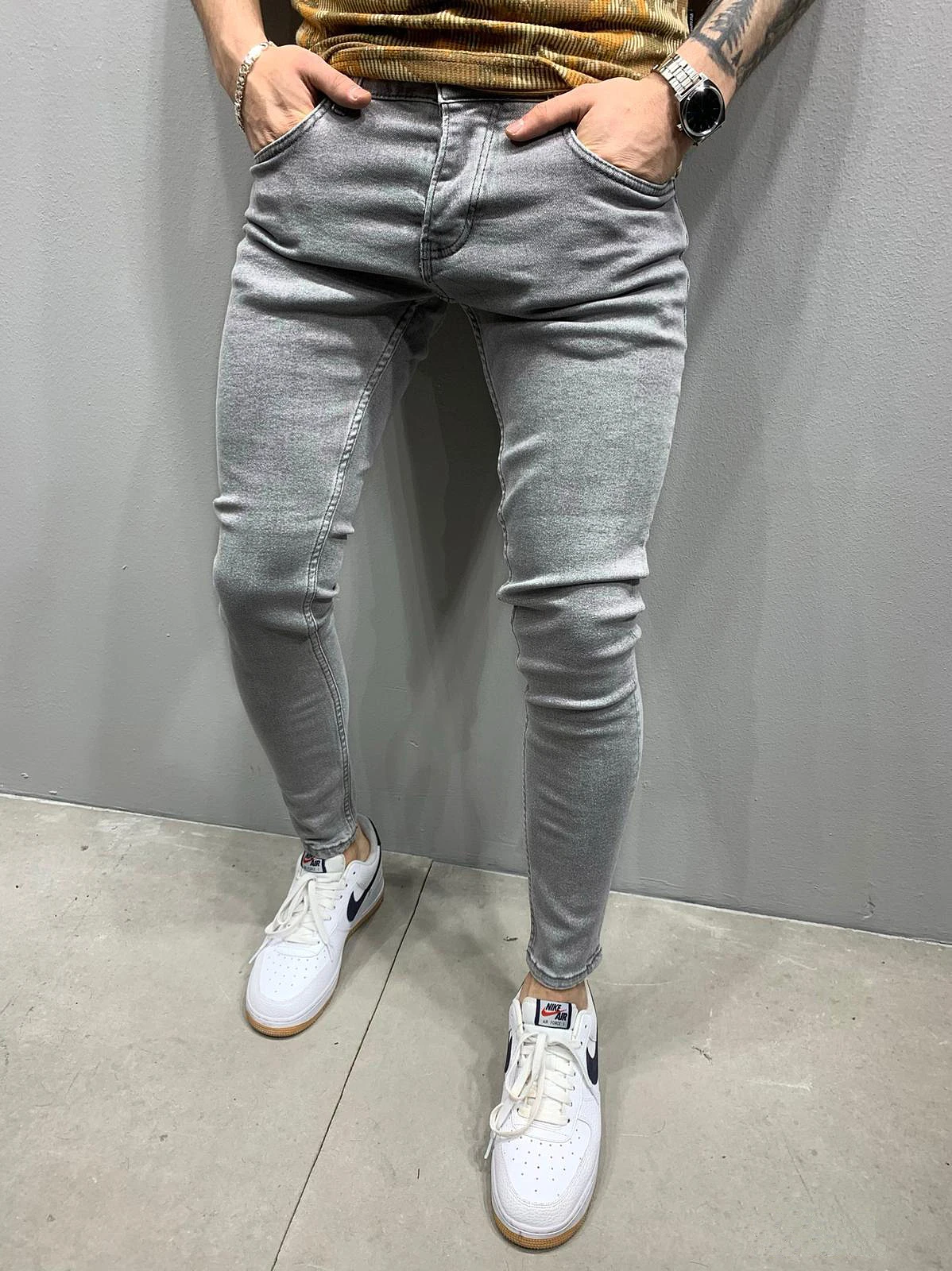 Męskie jeansy slim fit z przetarciami H011a szary