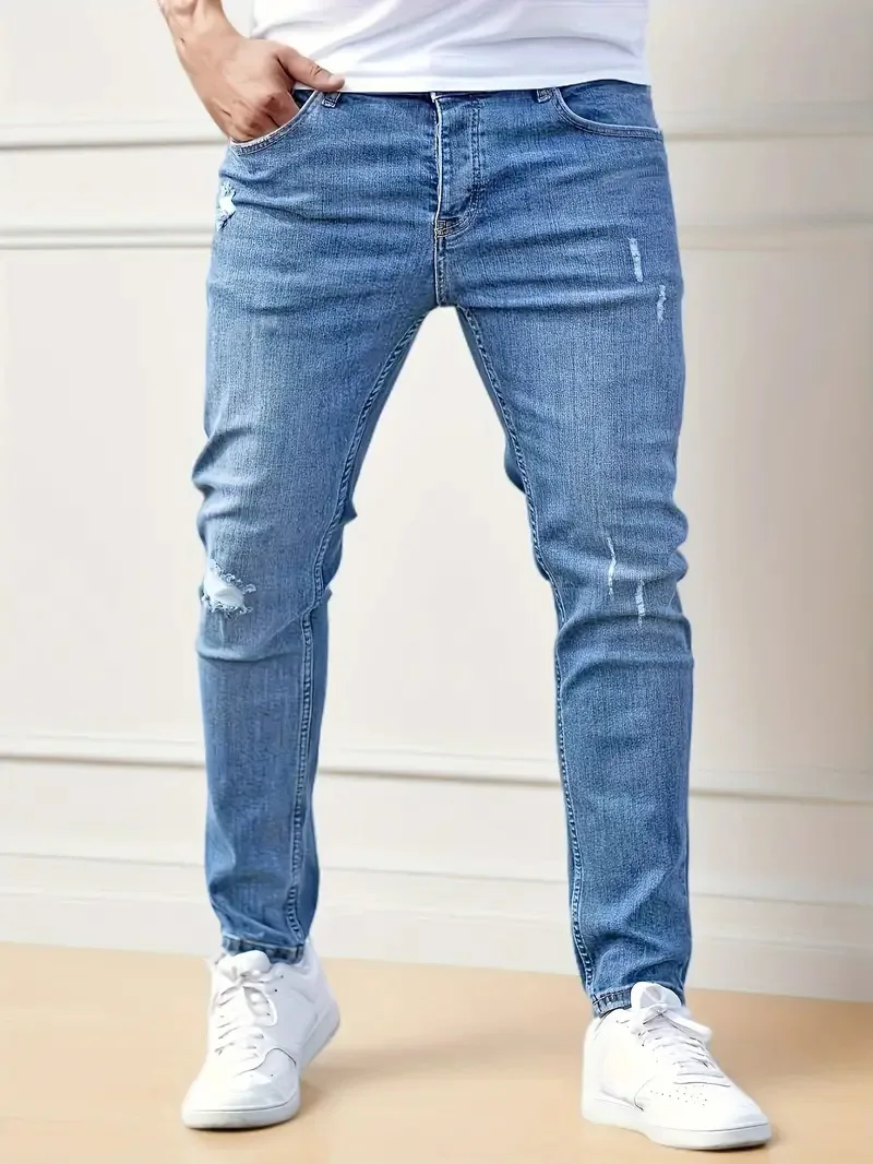 Męskie jeansy slim fit z przetarciami T220