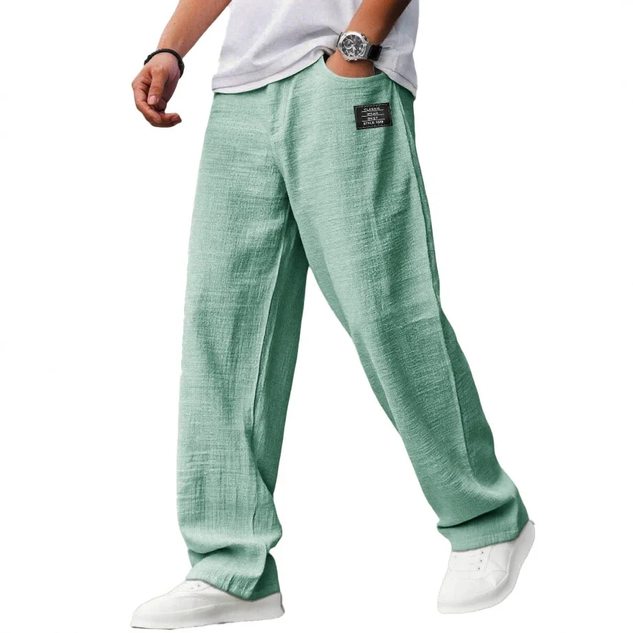Męskie luźne spodnie joggery w stylu vintage z naszywkami Jasnozielony