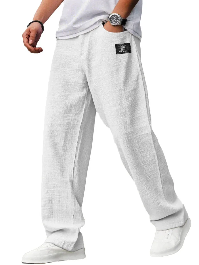 Męskie luźne spodnie joggery w stylu vintage z naszywkami Biały