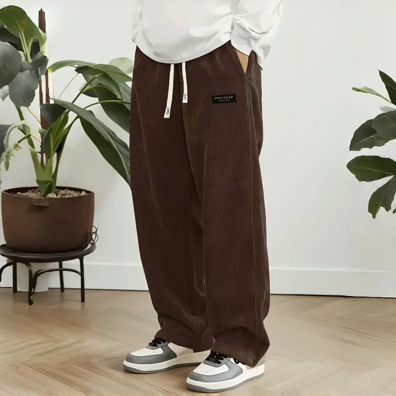 Męskie spodnie sztruksowe luźne baggy z elastyczną talią Cx 4brown