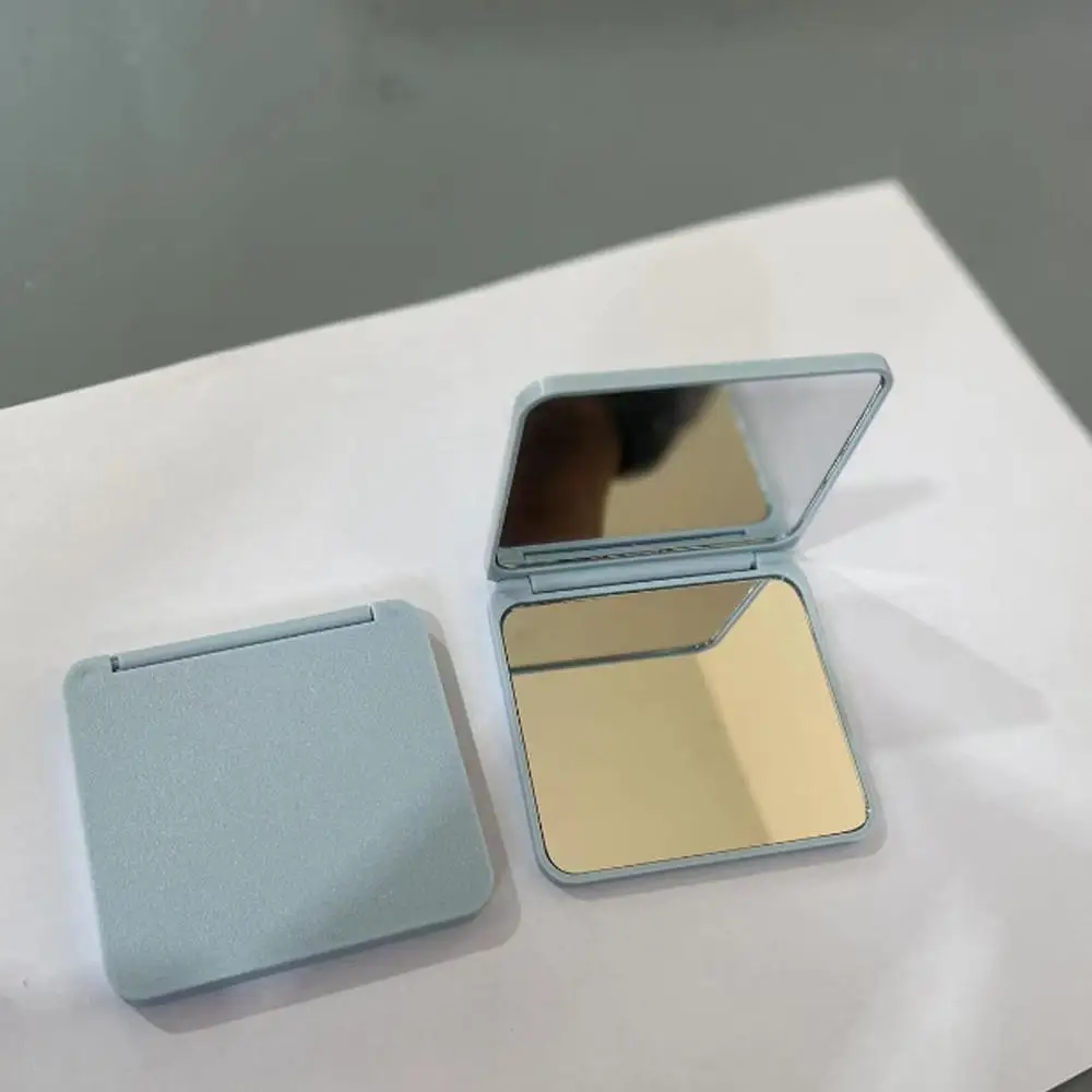 Mini lusterko do makijażu z motywem zwierzątka - składane dwustronne Czekolada