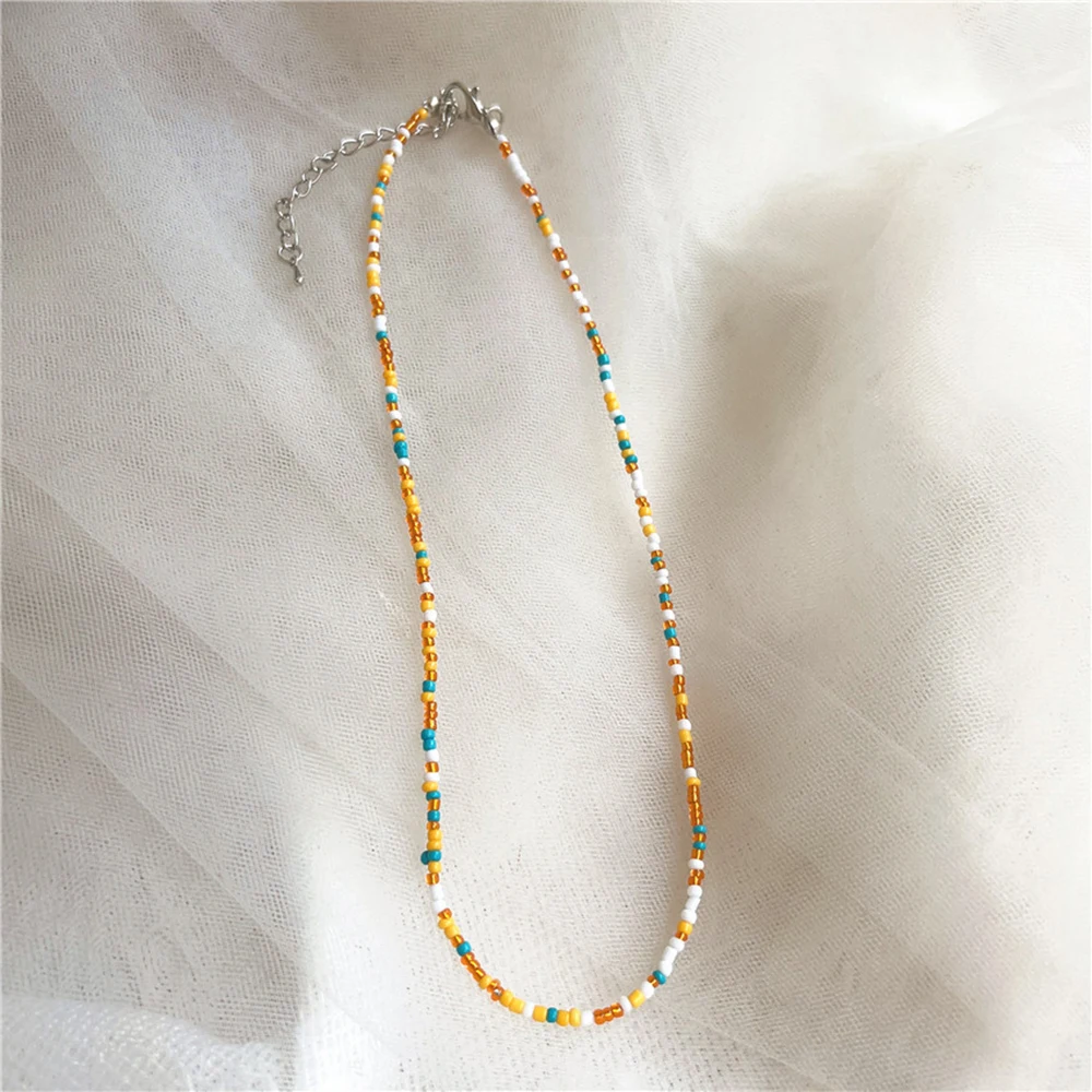 Naszyjnik choker boho z kolorowych koralików dla kobiet N11 orange.white