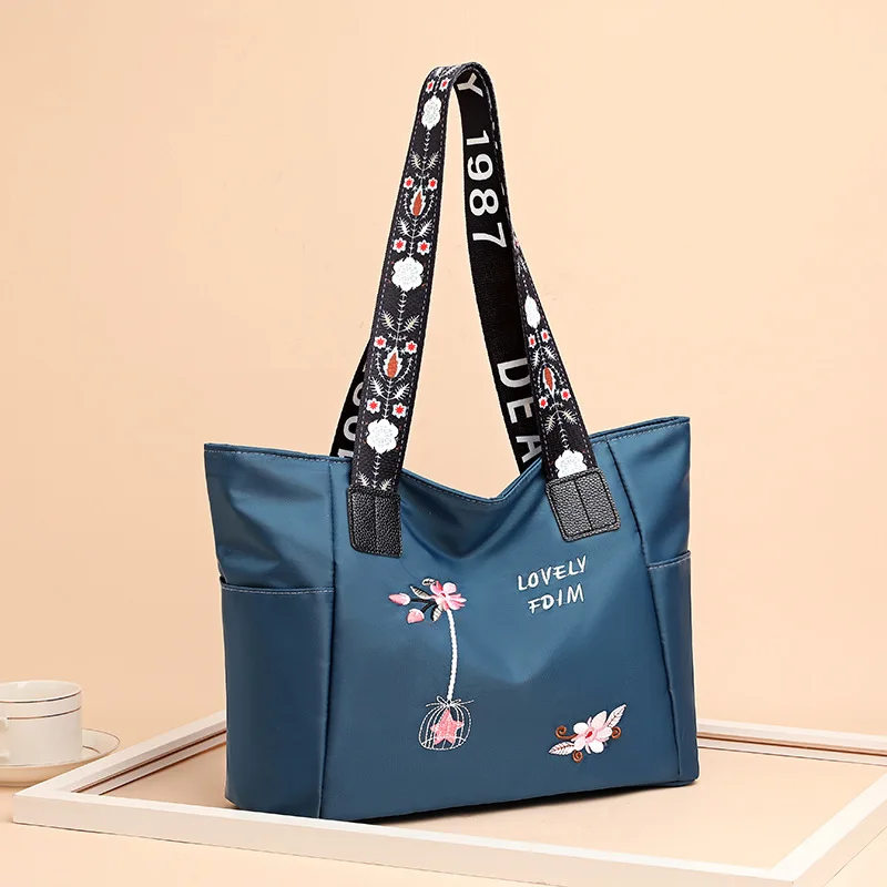 Nylonowa torba shopper damska z haftem, wodoodporna Niebieski