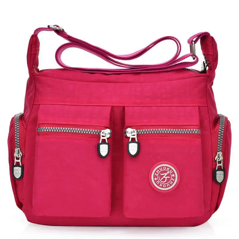 Nylonowa torebka na ramię Tilorraine crossbody — mała i solidna Gorący róż